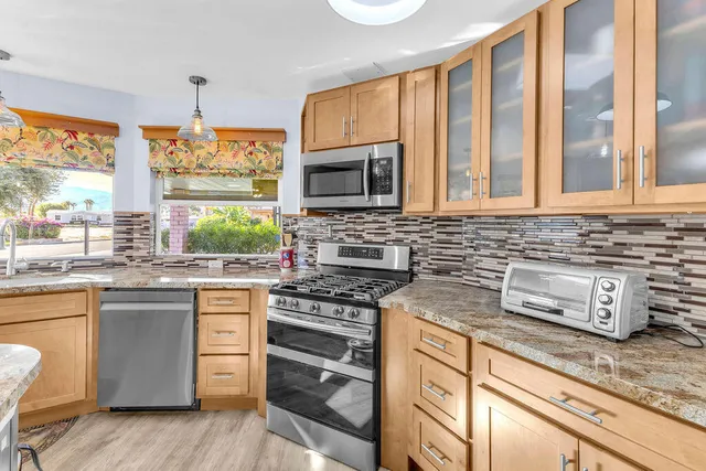 an aerial view of a house with a garden