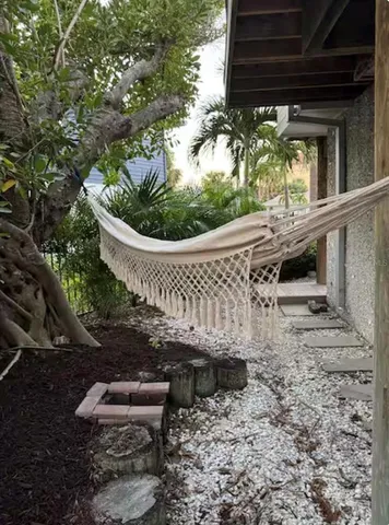a view of a lake with furniture