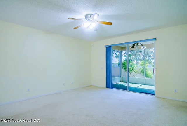 a view of a room with a large window