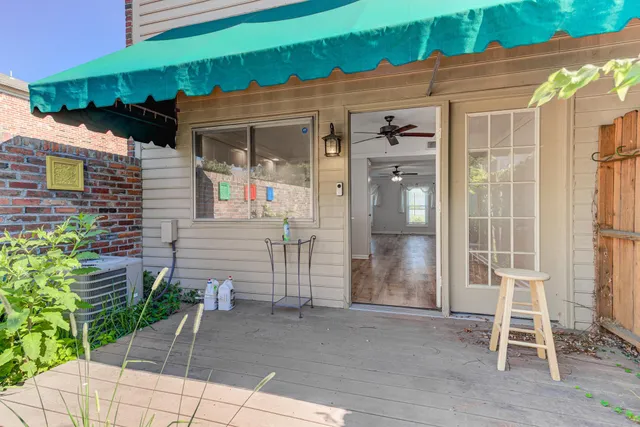 a front view of a house with a glass windows