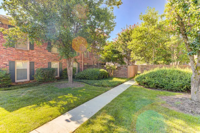 a house view with a garden space