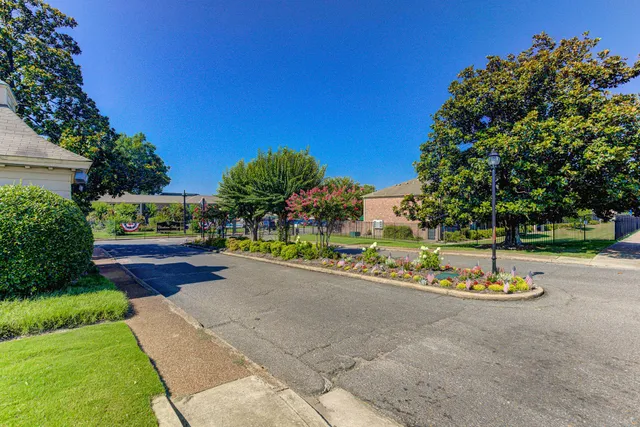 a view of a house with a street