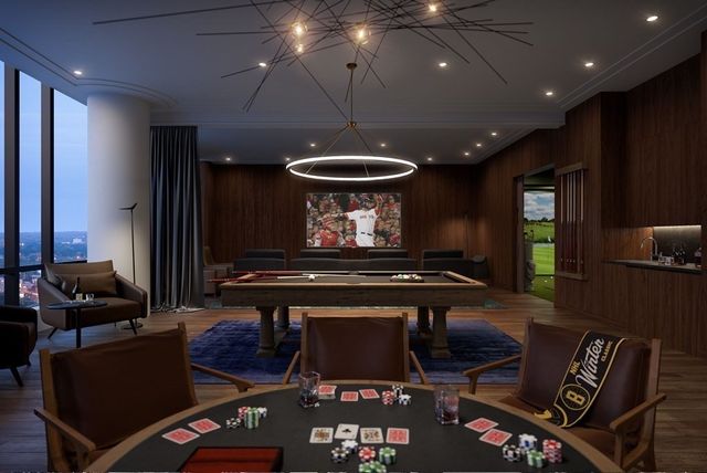 a dining room with a table and chairs