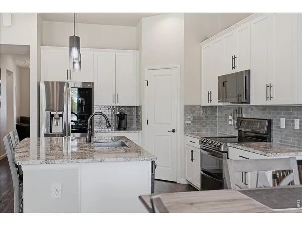 $825,000 | 5487 Chantry Drive, Windsor, CO 80550
