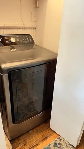 a room with furniture and a flat screen tv