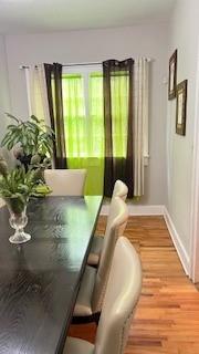 202 Veazey Street Union Point, GA 30669 - Photo 17 of 57 a bed sitting in a bedroom next to a window