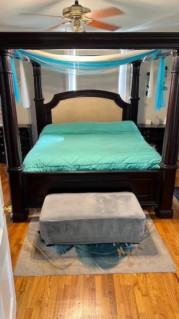 202 Veazey Street Union Point, GA 30669 - Photo 28 of 57 a bed sitting in a bedroom next to a larger window