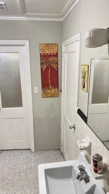 202 Veazey Street Union Point, GA 30669 - Photo 31 of 57 a bathroom with a sink a toilet and shower curtain