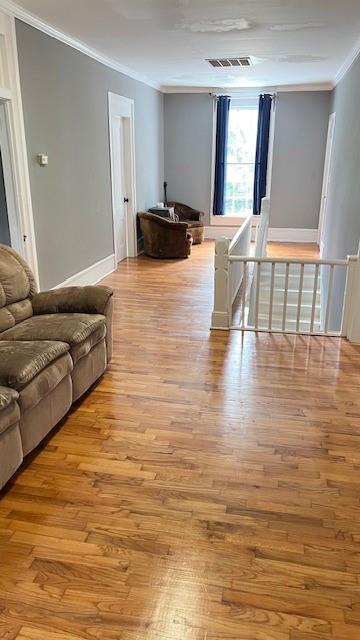 202 Veazey Street Union Point, GA 30669 - Photo 37 of 57 a living room with furniture and a large window