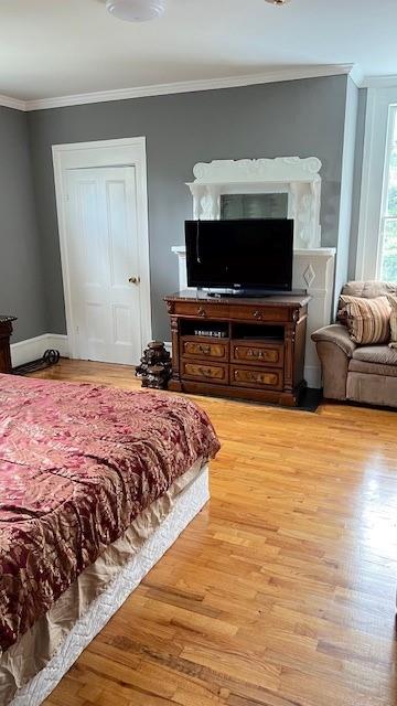 202 Veazey Street Union Point, GA 30669 - Photo 38 of 57 a bedroom with a bed and a flat screen television