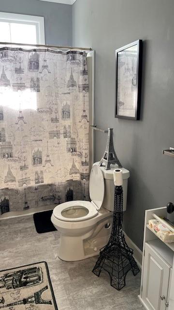 202 Veazey Street Union Point, GA 30669 - Photo 43 of 57 a bathroom with a toilet a sink and a mirror