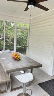 202 Veazey Street Union Point, GA 30669 - Photo 55 of 57 a table with chairs and window