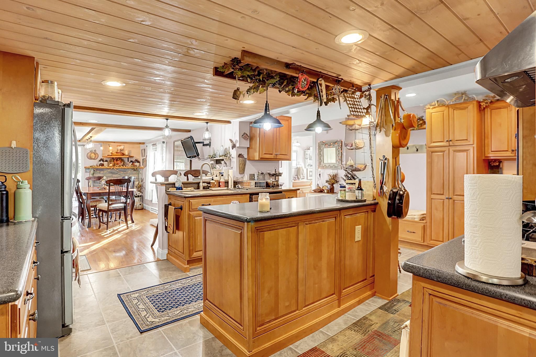 64 Metz Road Thompsontown, PA 17094 - Photo 20 of 59 a kitchen with stainless steel appliances granite countertop a sink and cabinets