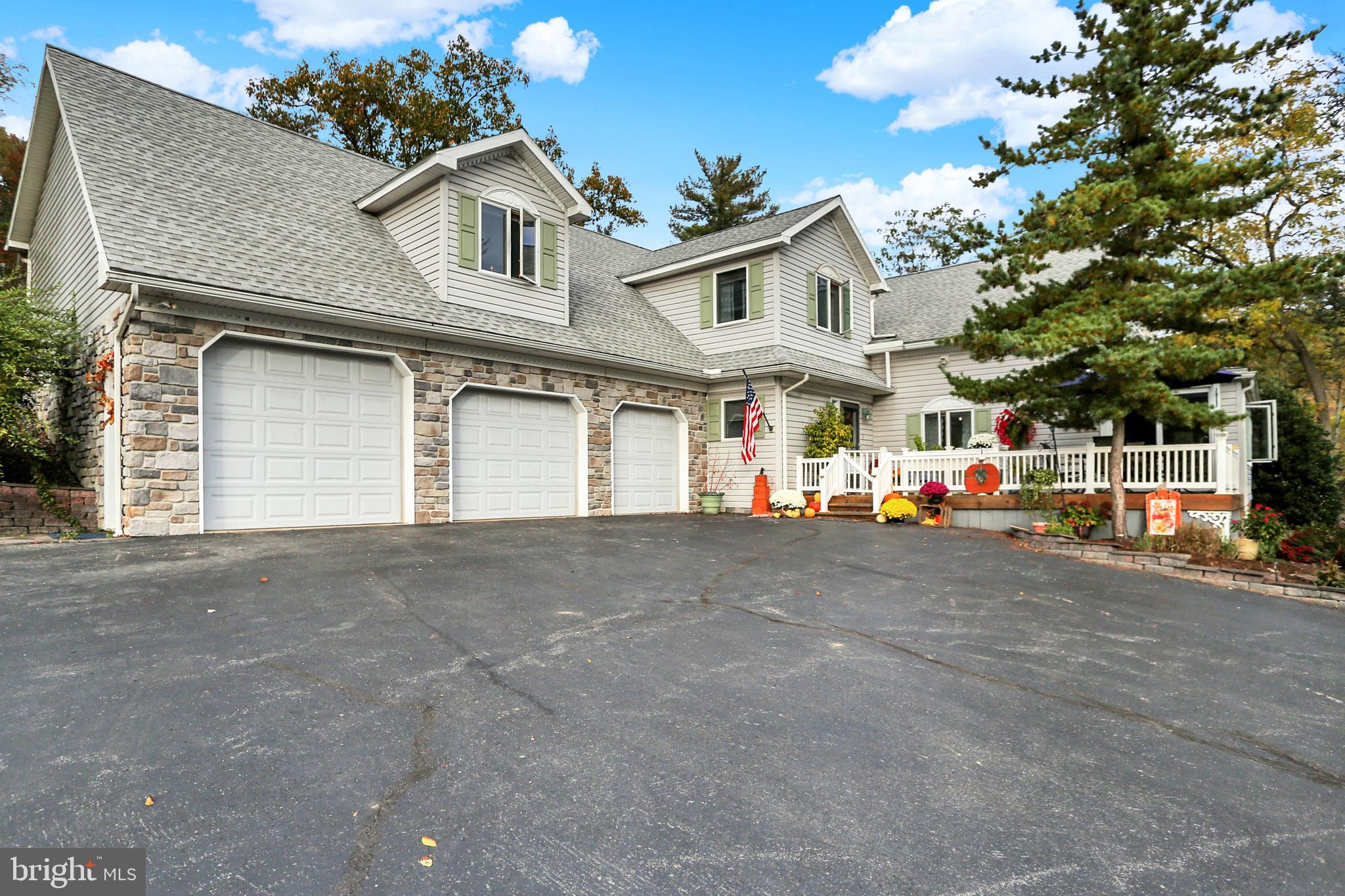 64 Metz Road Thompsontown, PA 17094 - Photo 2 of 59 a white house that has a tree in front of it
