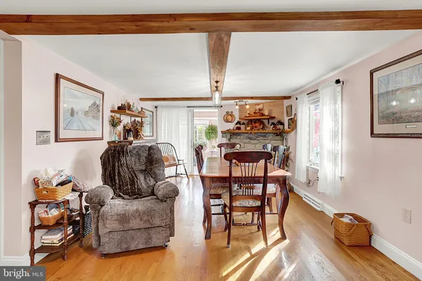 a lobby with furniture and flowers