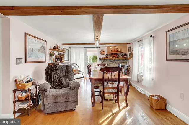 a lobby with furniture and flowers