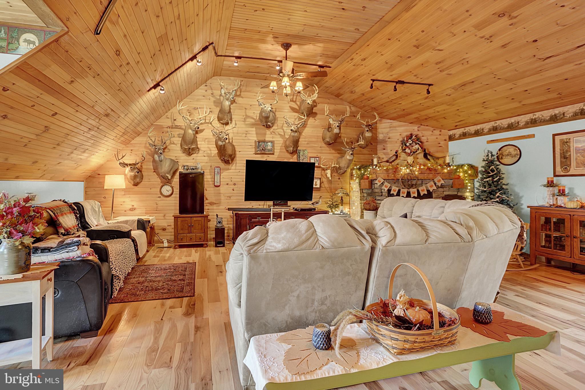 64 Metz Road Thompsontown, PA 17094 - Photo 39 of 59 a living room with furniture and a flat screen tv