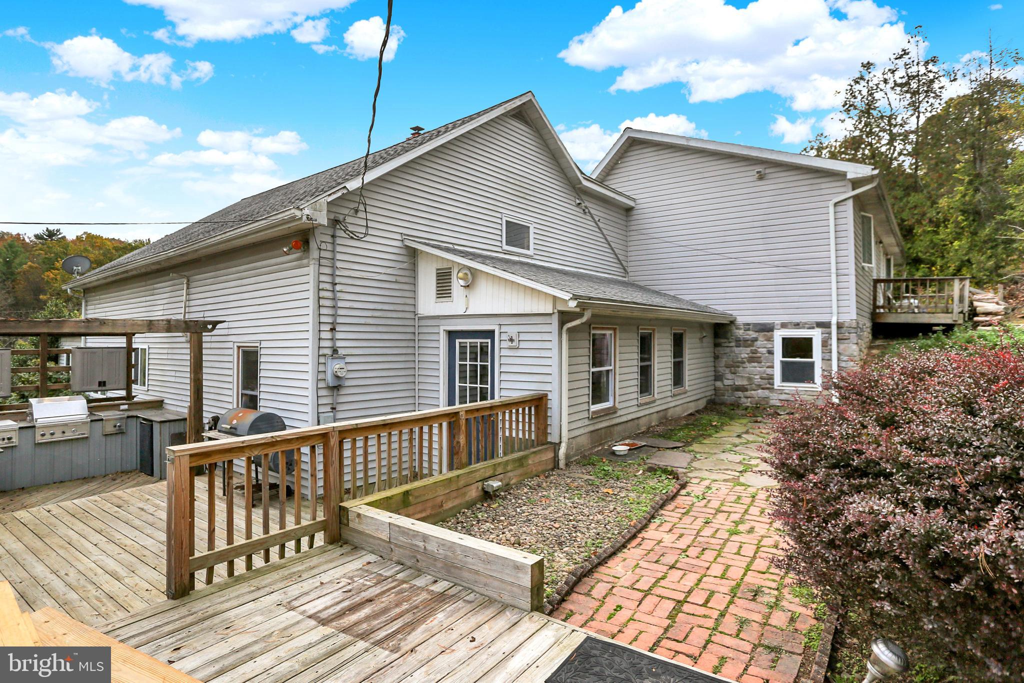 64 Metz Road Thompsontown, PA 17094 - Photo 7 of 59 a front view of house with yard roof deck