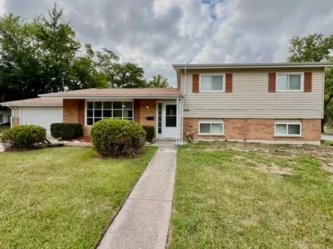 a house view with a garden space