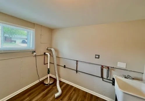 a view of entryway with wooden floor
