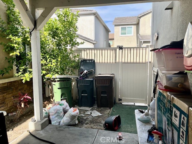 11 Lilac Lane Compton, CA 90221 - Photo 9 of 9 a living room with furniture and a floor to ceiling window