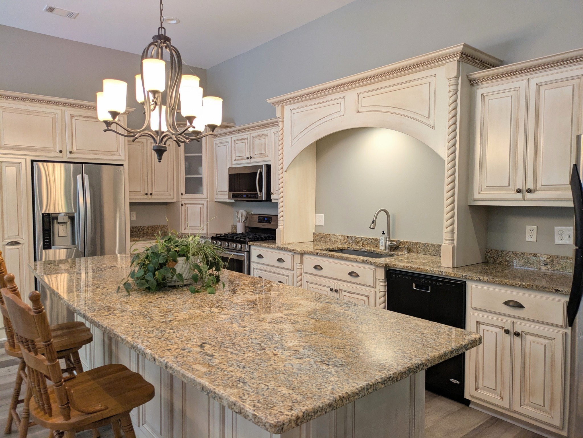 3425 Hopkins Bridge Road Unionville, TN 37180 - Photo 11 of 83 a kitchen with stainless steel appliances granite countertop a sink stove and refrigerator