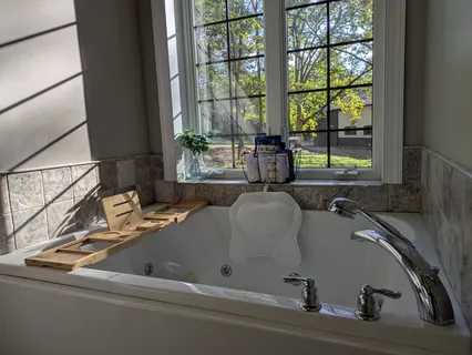 a wooden fence with trees in the background