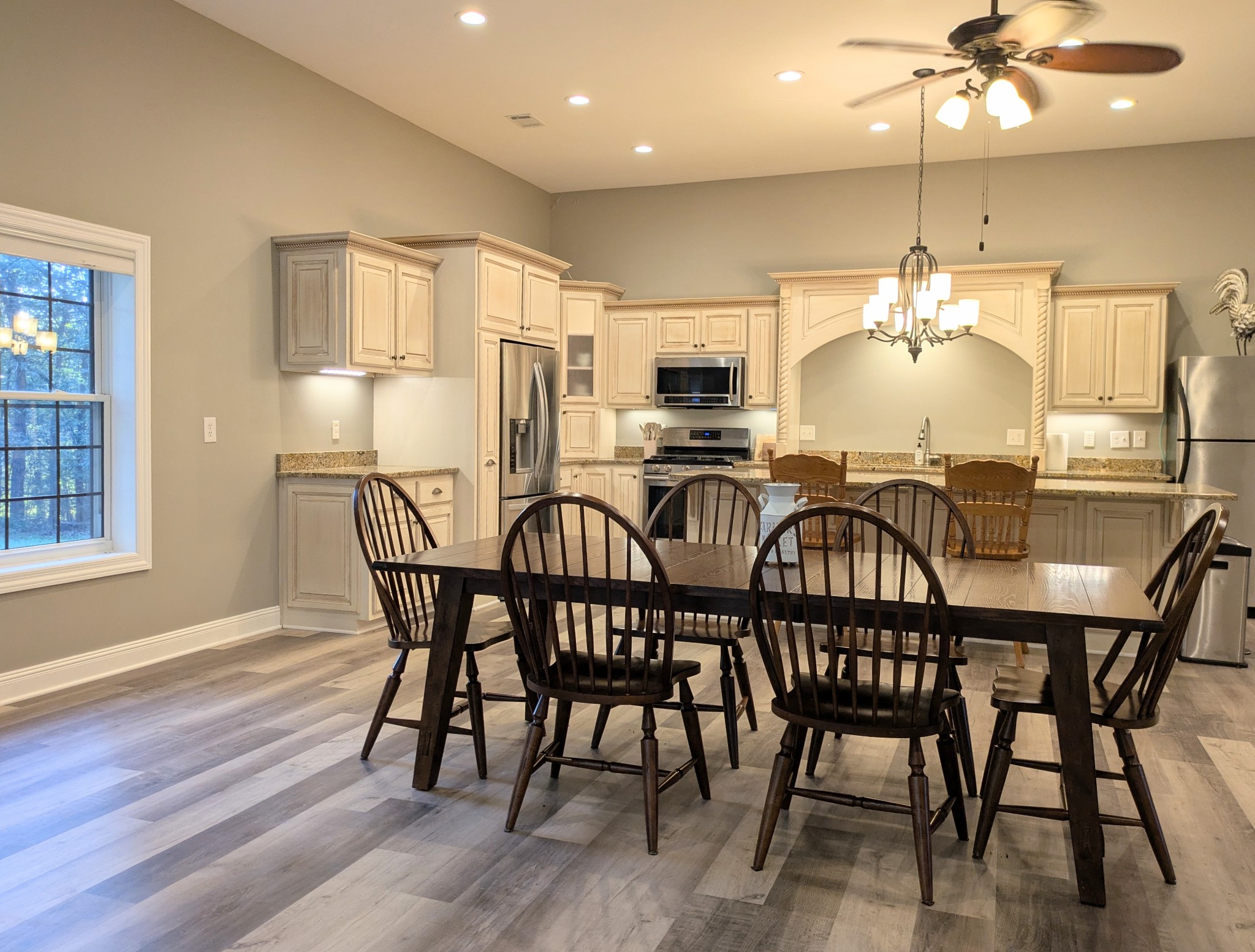3425 Hopkins Bridge Road Unionville, TN 37180 - Photo 9 of 83 a view of a dining room with furniture window and wooden floor