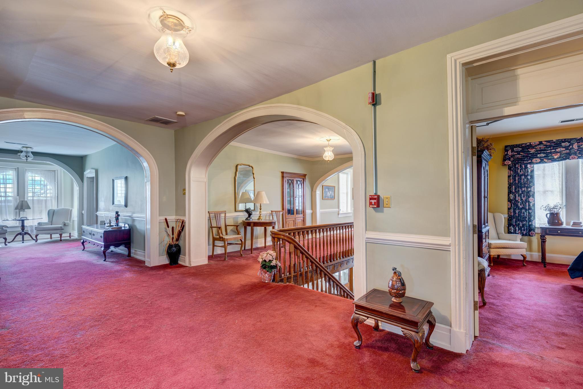 6000 Middleburg Road Keymar, MD 21757 - Photo 20 of 59 Arches & woodwork adorn the upstairs hallways
