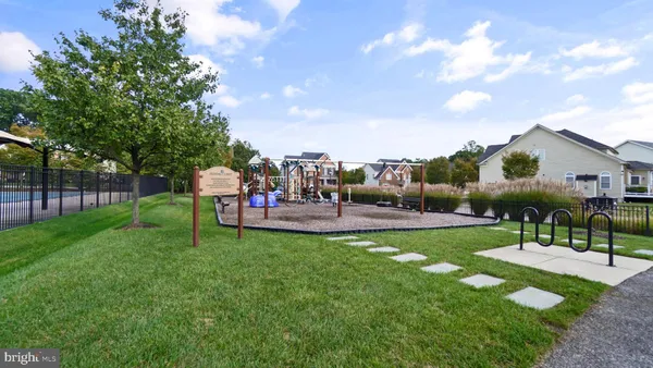 a view of a park with a slide
