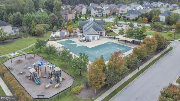 a view of swimming pool from a balcony