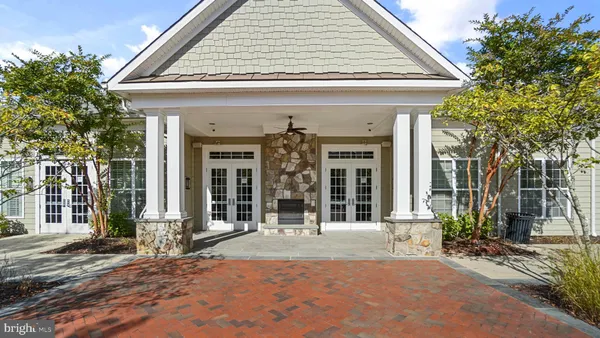 a front view of a house with a porch