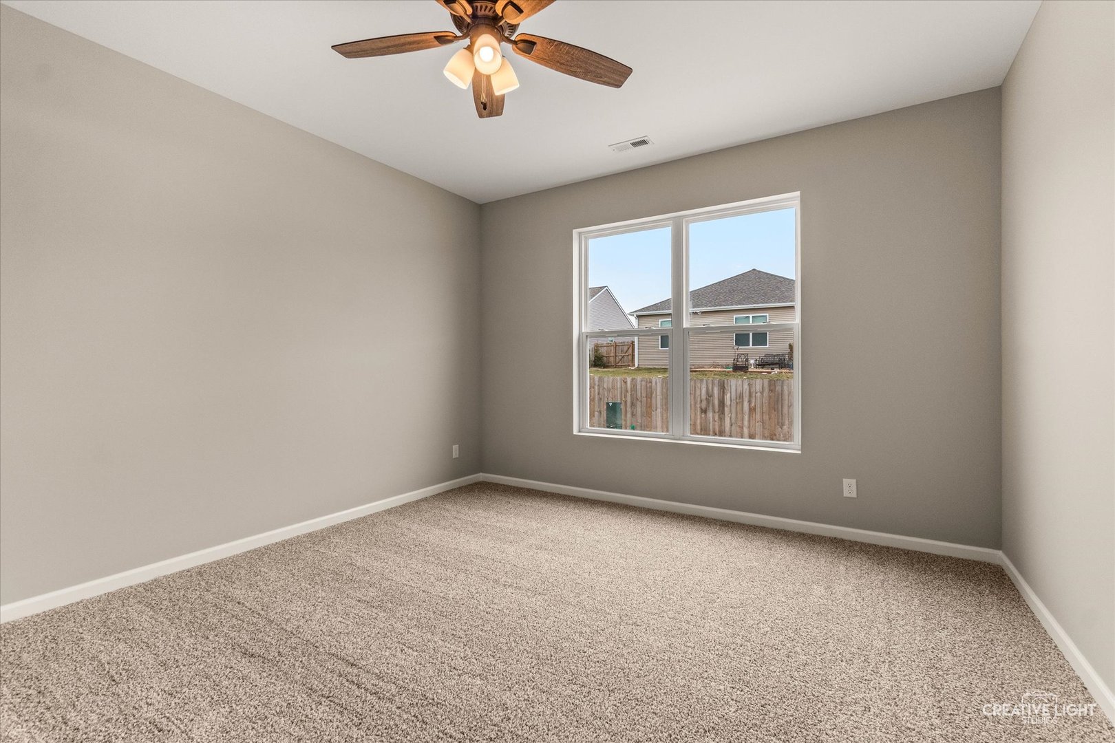 520 Preston Street Cortland, IL 60112 - Photo 12 of 16 an empty room with a window