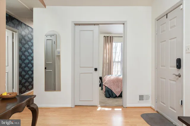 a view of a livingroom with furniture and windows