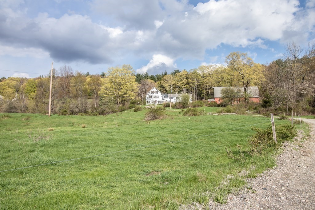 19 West S Black Road Leyden, MA 01337 - Photo 4 of 42 a view of a big yard with lots of green space
