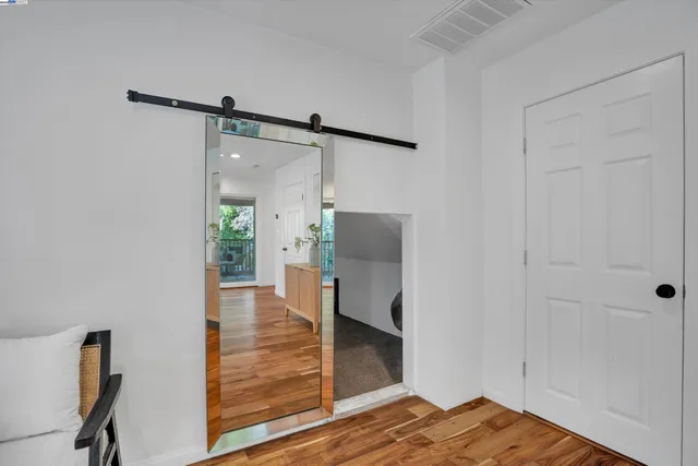 a view of a bedroom and bathroom