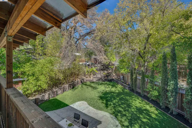 a view of backyard with green space