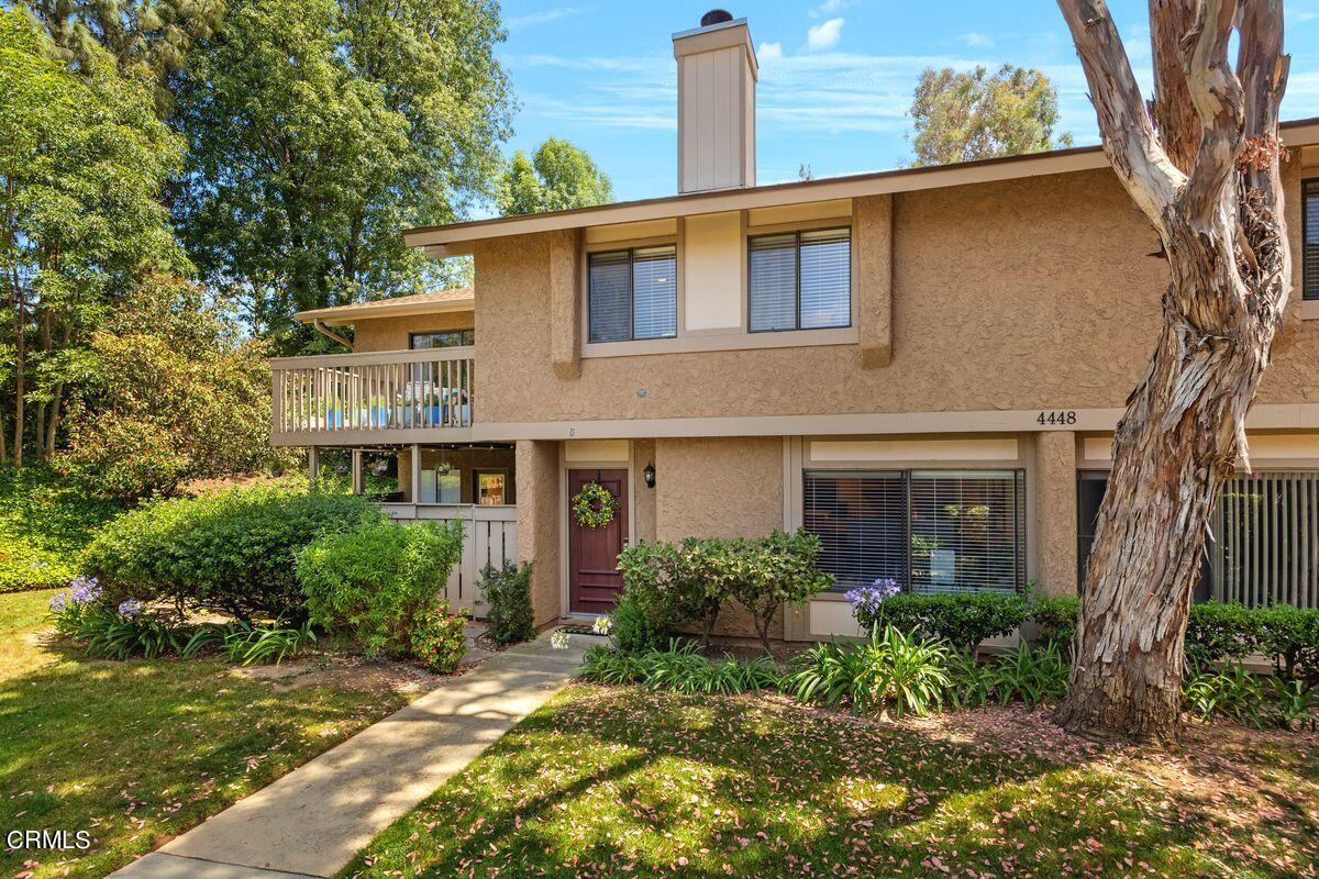 4448 Lubbock Drive, Unit D Simi Valley, CA 93063 - Photo 2 of 19 a front view of a house with a garden