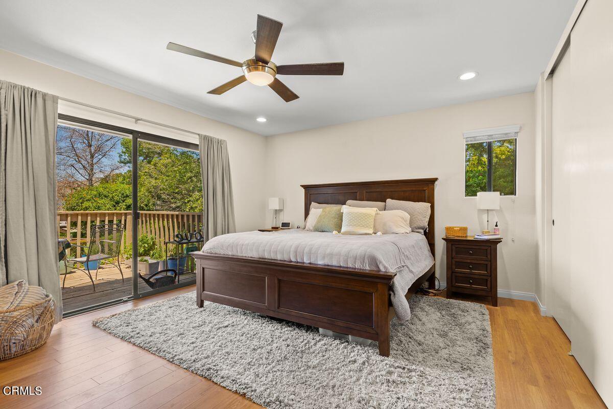 4448 Lubbock Drive, Unit D Simi Valley, CA 93063 - Photo 6 of 19 a bedroom with a large bed and a large window