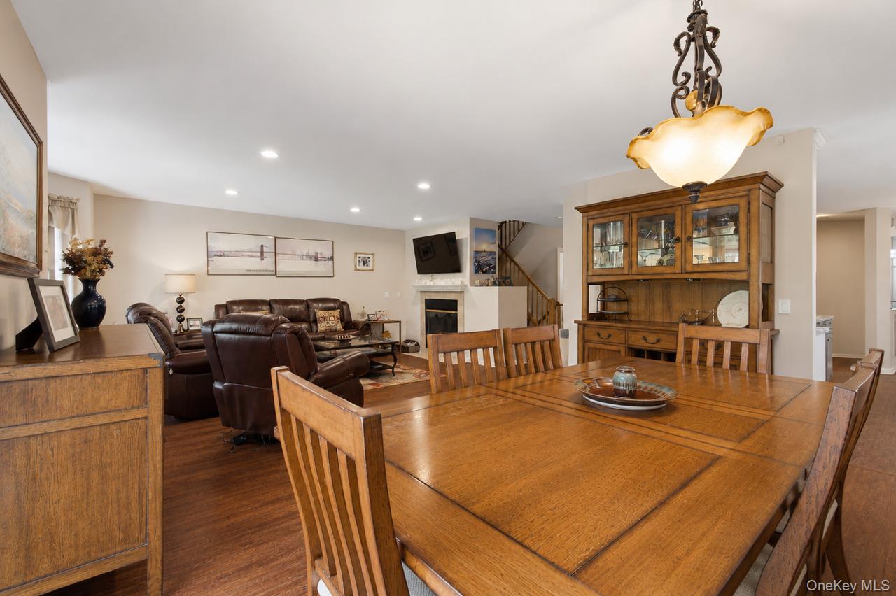 64 Roma Orchard Road Peekskill, NY 10566 - Photo 14 of 40 Dining area featuring a decorative chandelier with an alabaster-style shade