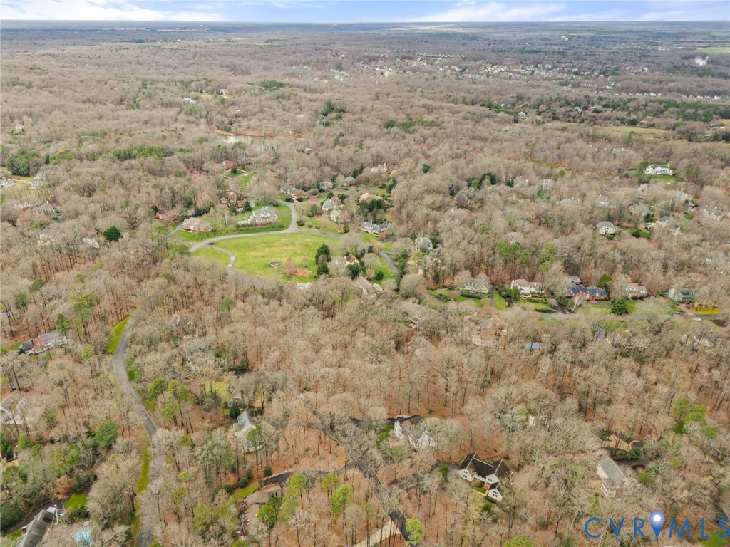 11240 Turnley Lane Midlothian, VA 23113 - Photo 4 of 15 a view of a field with wooden floor