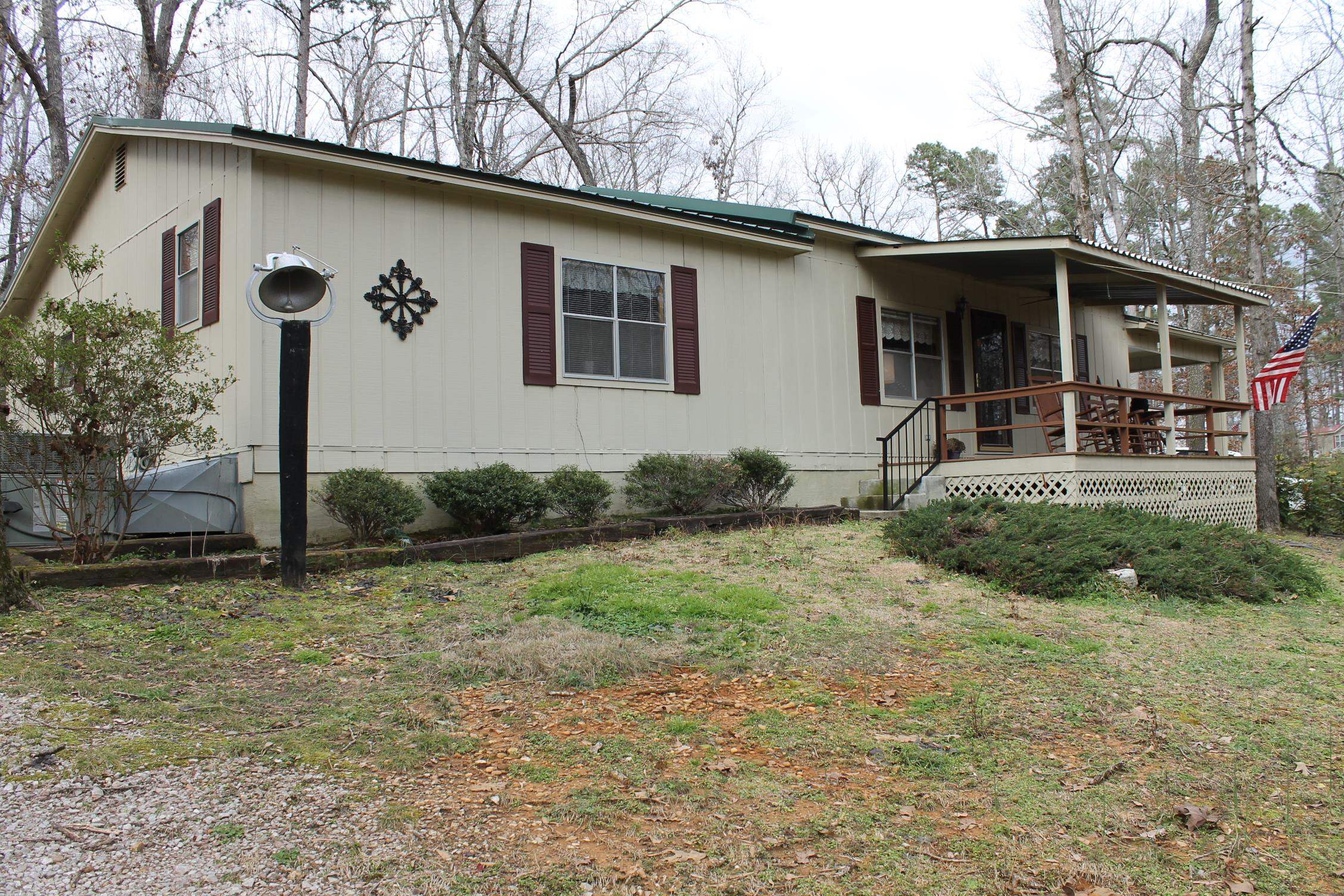 260 Bluebird Road Counce, TN 38326 - Photo 2 of 15 a front view of a house with garden