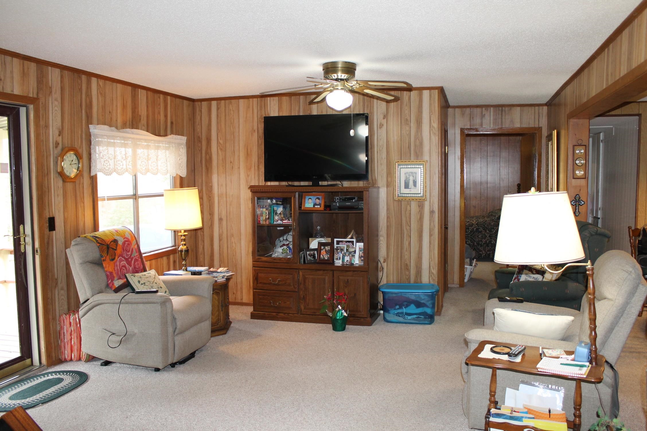 260 Bluebird Road Counce, TN 38326 - Photo 3 of 15 a living room with furniture and a flat screen tv