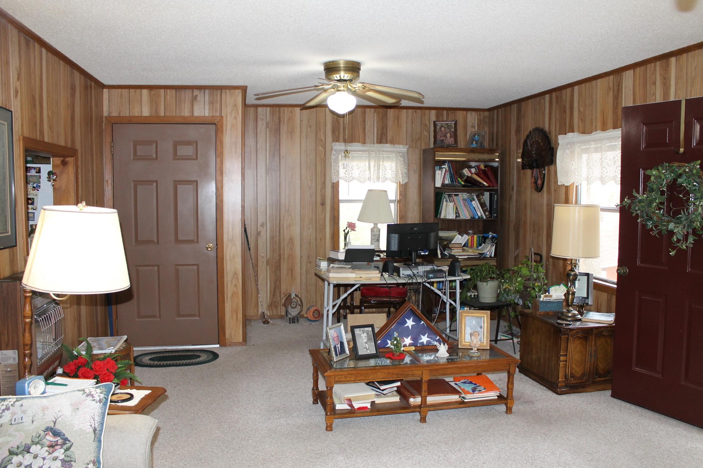 260 Bluebird Road Counce, TN 38326 - Photo 4 of 15 a room with furniture and a lamp