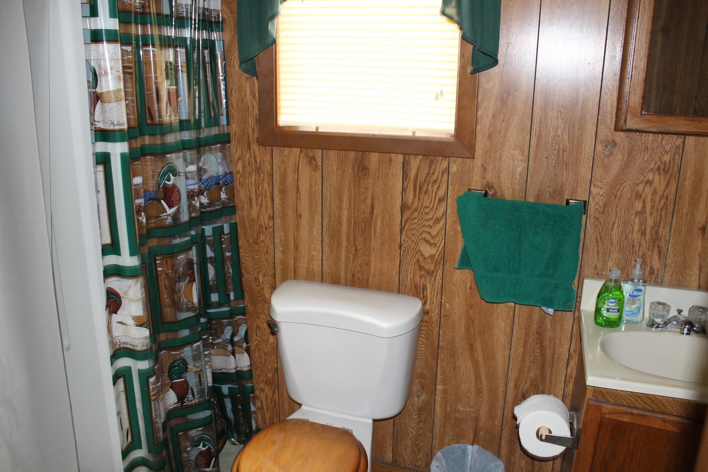 260 Bluebird Road Counce, TN 38326 - Photo 8 of 15 a bathroom with a toilet and a sink