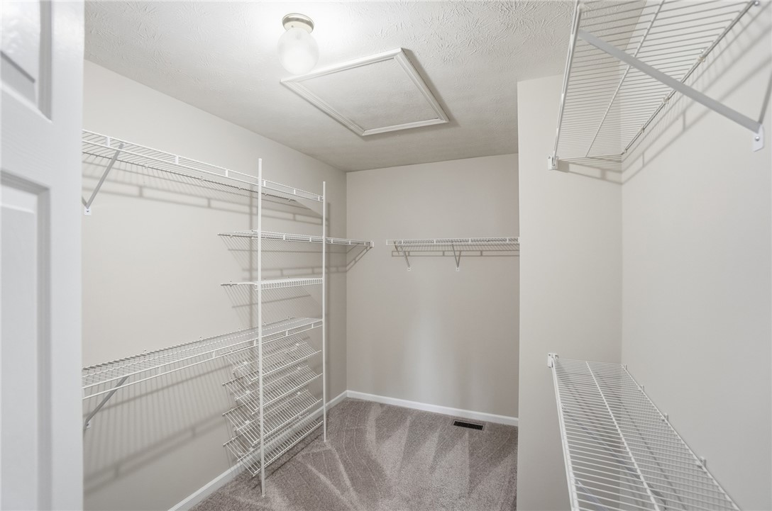 10 Chase Court Springboro, OH 45066 - Photo 40 of 75 This spacious closet features ample shelving for organized storage, ensuring a clutter-free living space.