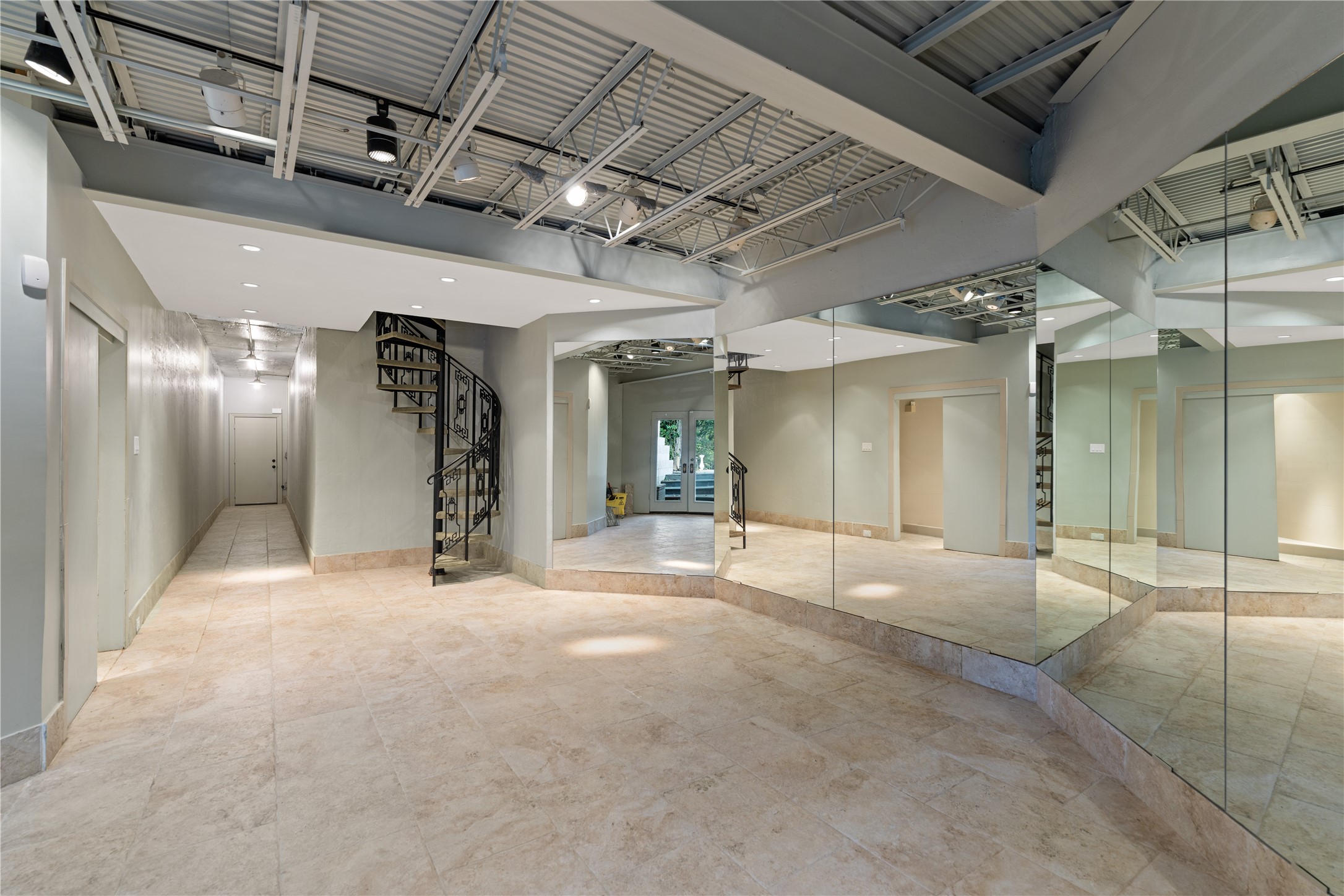 26 Crestwood Drive Houston, TX 77007 - Photo 23 of 24 Another basement room with a full bathroom with access to the grounds could be a workout room or a guest room or pool house style room.