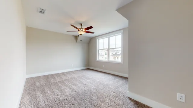 a front view of a house with yard