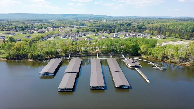 a view of a swimming pool with patio