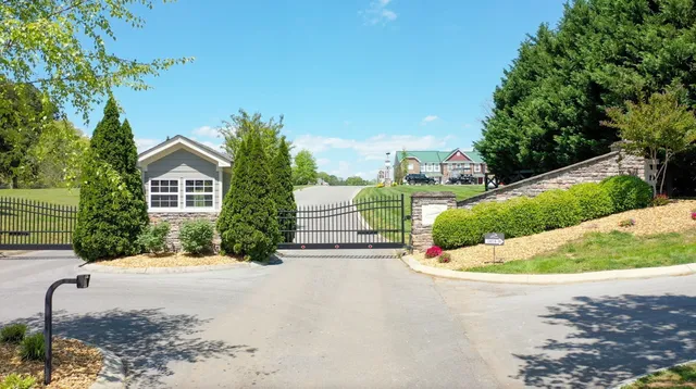 a view of house with yard